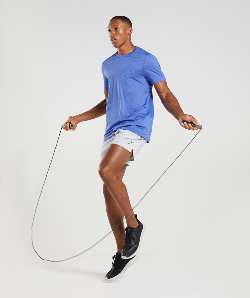 Gymshark αθλητικό μπλουζάκι με ρίγες σε μπλε γήπεδο